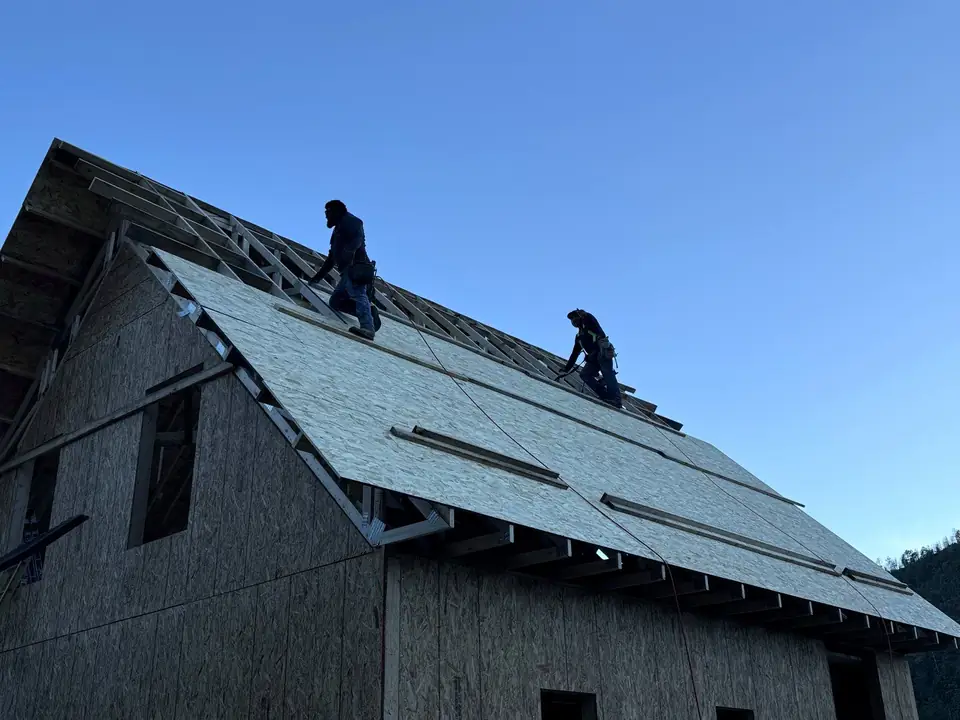 IngenuBuild crew installing roof sheathing on a new home in Grand Junction, Colorado