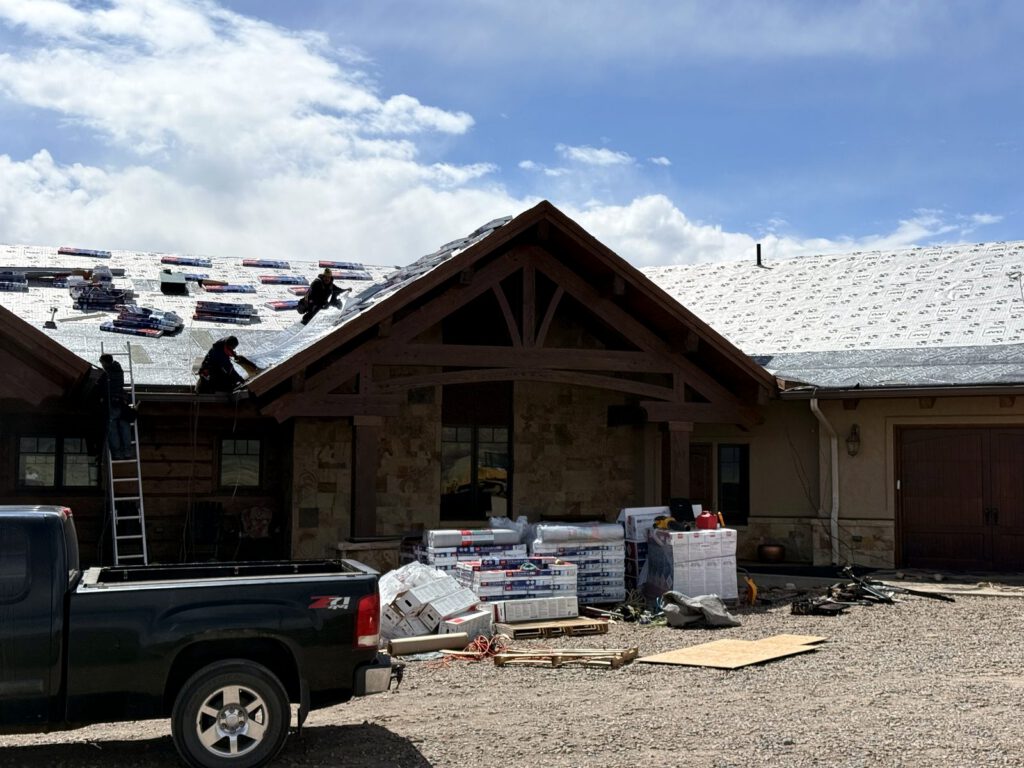 Roofing on a new timber-frame custom home