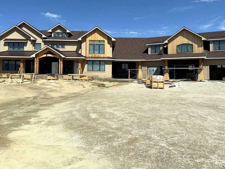 Roofing on a new-construction townhome row